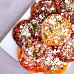 This Heirloom Tomato Salad recipe lets the full flavor of the tomatoes shine, while providing the right amount of creaminess and nuttiness with the feta cheese and pine nuts.