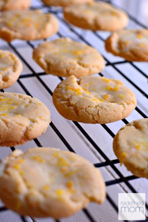 This citrus-glazed shortbread cookie recipe has a secret ingredient that makes it "love at first bite" for lemon or orange fans. So simple, but oh so good. If you are addicted to Dole Whip at Disney, this is your cookie. Trust me.
