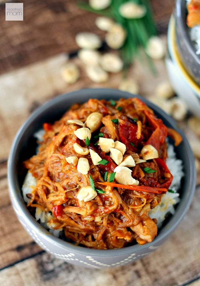 Don't let your slow cooker collect dust during the summer months! This 9-ingredient Slow Cooker Thai Peanut Chicken Recipe is easy to make, tastes like takeout and can be served with rice, noodles, or as lettuce wraps.