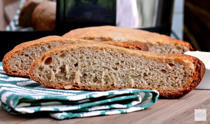 This Slow Cooker No Knead Peasant Bread Recipe lets you to have fresh bread in the summer without heating up the house. Perfect compliment to salads, pasta, grilled meat or a wine/cheese tray.