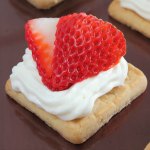 This kid-friendly six-ingredient no-bake strawberry cheesecake cookie bites recipe is an easy and lower calorie alternative to strawberry cheesecake. Plus, you can whip up a batch in under 15 minutes...perfect party food.