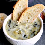 This creamy Slow Cooker Spinach Artichoke Parmesan Soup takes all the things you love about the dip and makes it into a soup. Perfect side for bread and sandwiches.